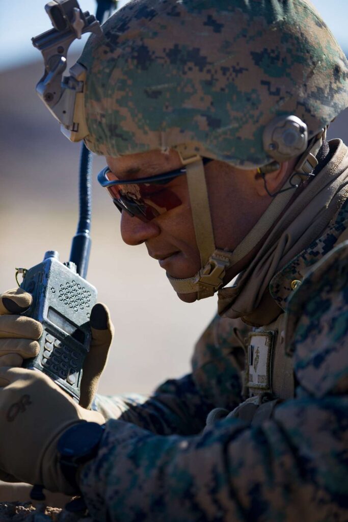 A US soldier wearing combat earplugs to prevent hearing damage.