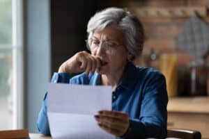 Senior Woman Reviewing her Asset Statements